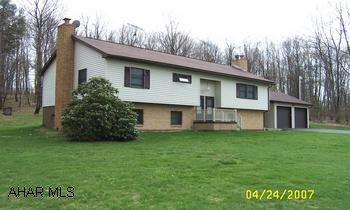 Split-entry home with two finished floors. 1485 square feet per floor. Two kitchens, 3 full baths, 4 bedrooms.  All in very good condition.