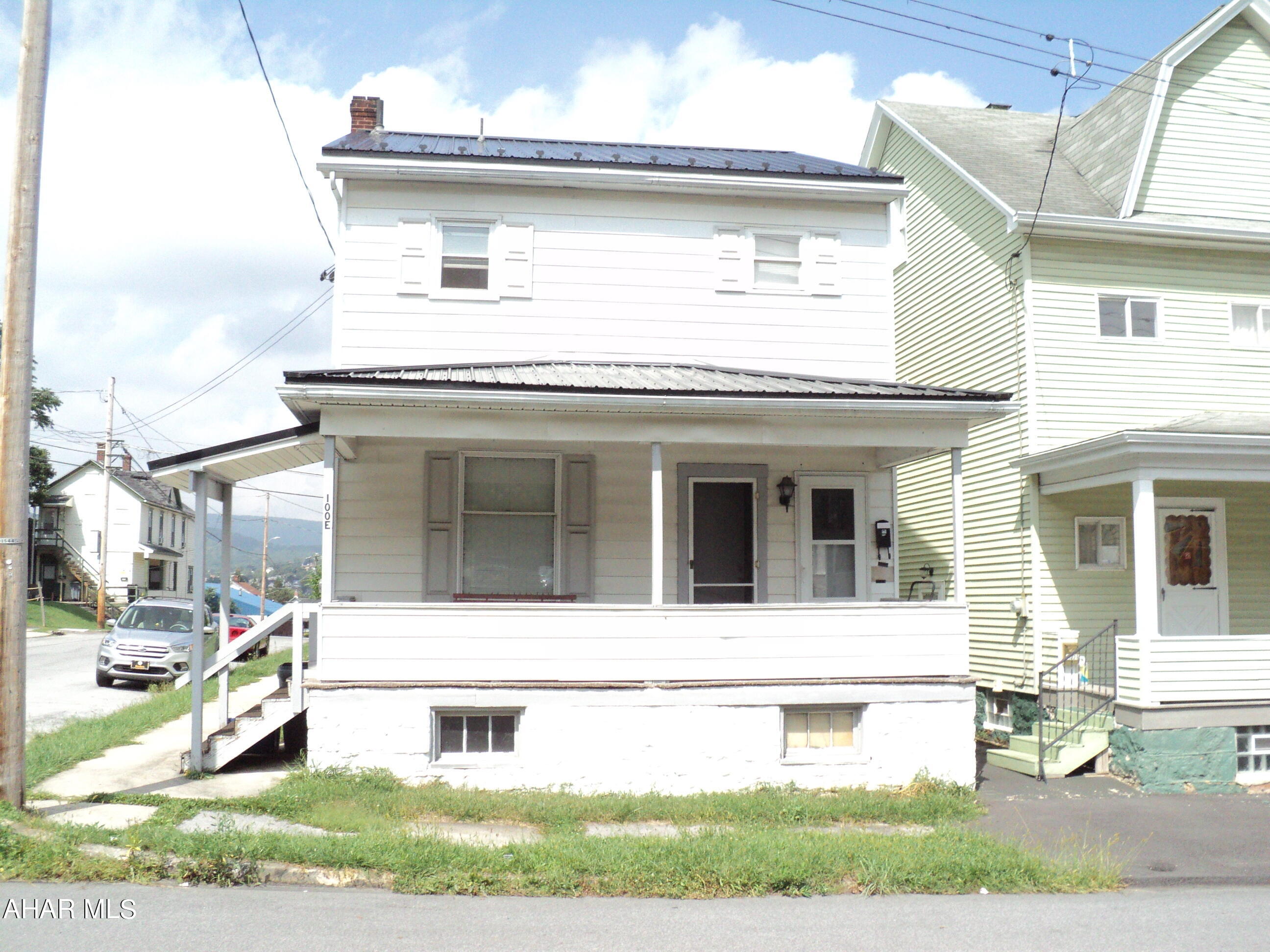 This rental property has a steady income, newer metal roof, hot water tanks and furnace.  Separate meters for electric, water and sewer per unit.  There is a single meter for natural gas also a separate electric meter for the unfinished basement. Seller pays monthly electric, gas, trash, water & sewer bills.  Tenants in Unit # 1 take care of lawn cutting and snow removal. Unit # 2 needs TLC and there is a room which could be used as a second bedroom or walk in closet. There is only one heating thermostat which is located in the downstairs unit. Buyer to confirm sq ft and taxes etc.