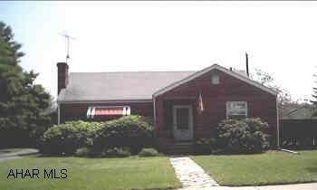 Great brick starter!  H/W floors, fireplace, large lot, privacy fence, garage, shed.  Survey available!  Dog in basement.  Call Linda Lewis at 886-7175 to show, 24 hrs. notice please.