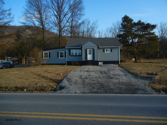 Nicely redone 3 bedroom, 1 bath 1.5 story. Beautiful new oak kitchen. New bath, flooring, and more. Great decor! A must see!