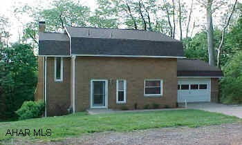 New roof, soffit, fascia, gutters, new furnace, new carpet on all 3 floors, new kitchen, 2 new baths, new windows and doors, new verticals and mini blinds. All new appliances, refrigerator, stove, microwave, dishwasher.
