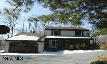 LOVELY 2 STORY ON 1.8 ACRES IN PRIME LOCATION. HW FLOORS FOYER, LR, DR, KITCHEN. STEP-DOWN FAMILY ROOM W/FIREPLACE. FRONT PORCH, REAR DECK. ELECTRIC STORAGE HEAT ON A MONITOR SYSTEM $220/MONTH. CONTACT SUSAN 935-8252.