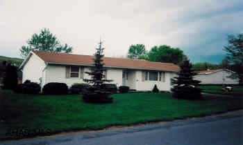 Comfortable newer 1320 sq. ft. ranch home on double lot. 3BR/1 3/4 BA. Central air, main level laundry, all appliances included.