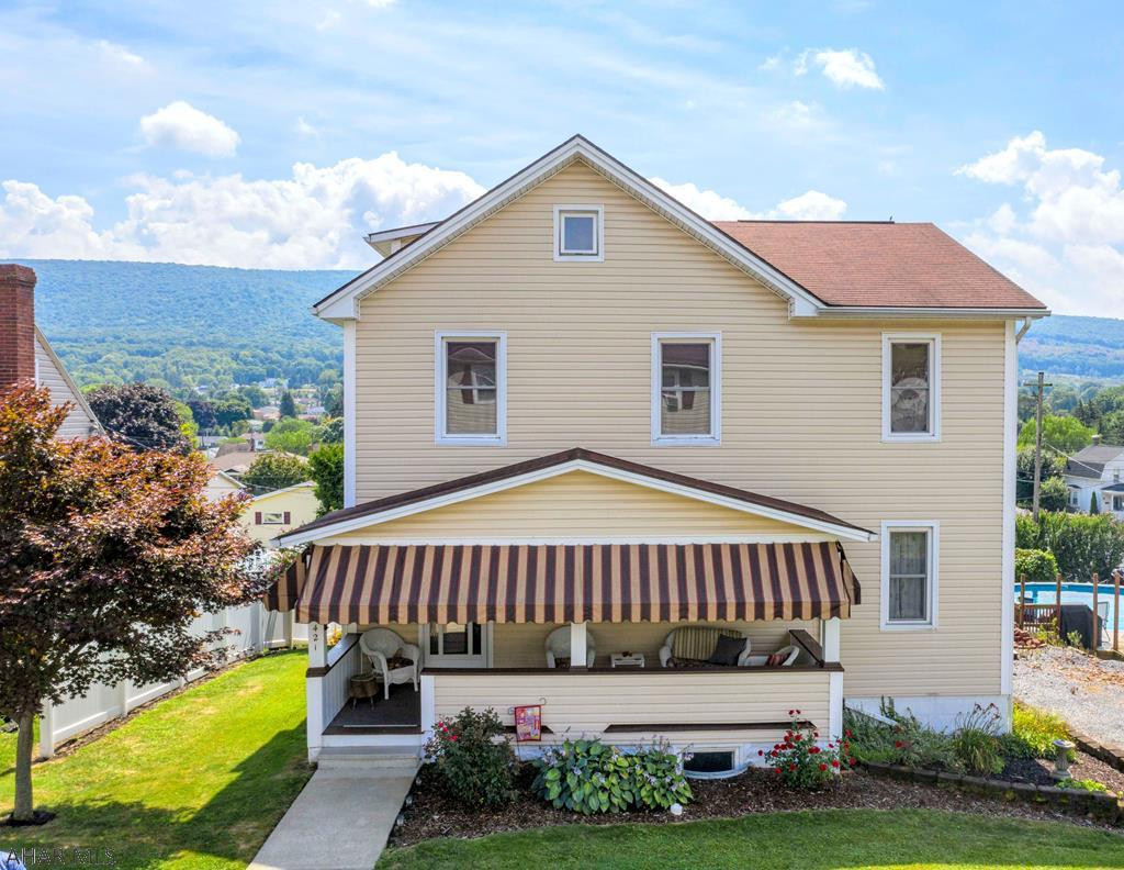 Beautifully updated 3 bedroom, 3 bath home in Altoona with spectacular views & 3 car garage! Enjoy the raised, 2 level deck showcasing breathtaking views of the mountains as you sip your morning coffee or grill dinner out. The covered front porch is also the perfect place to unwind. Wicker furniture included! Inside, you'll find custom wood work throughout, updated flooring & lots of character! The first floor features high ceilings, custom cabinets in the kitchen & a farmhouse style, deep sink. The office offers custom built-ins & a large desk. Living room is wired for sound. Upstairs, discover the master suite w/walk in closet & dressing room connected to a Jack and Jill bath. Another full bath central vac on all floors. Must see! (Located in Pleasant Valley Elementary area)