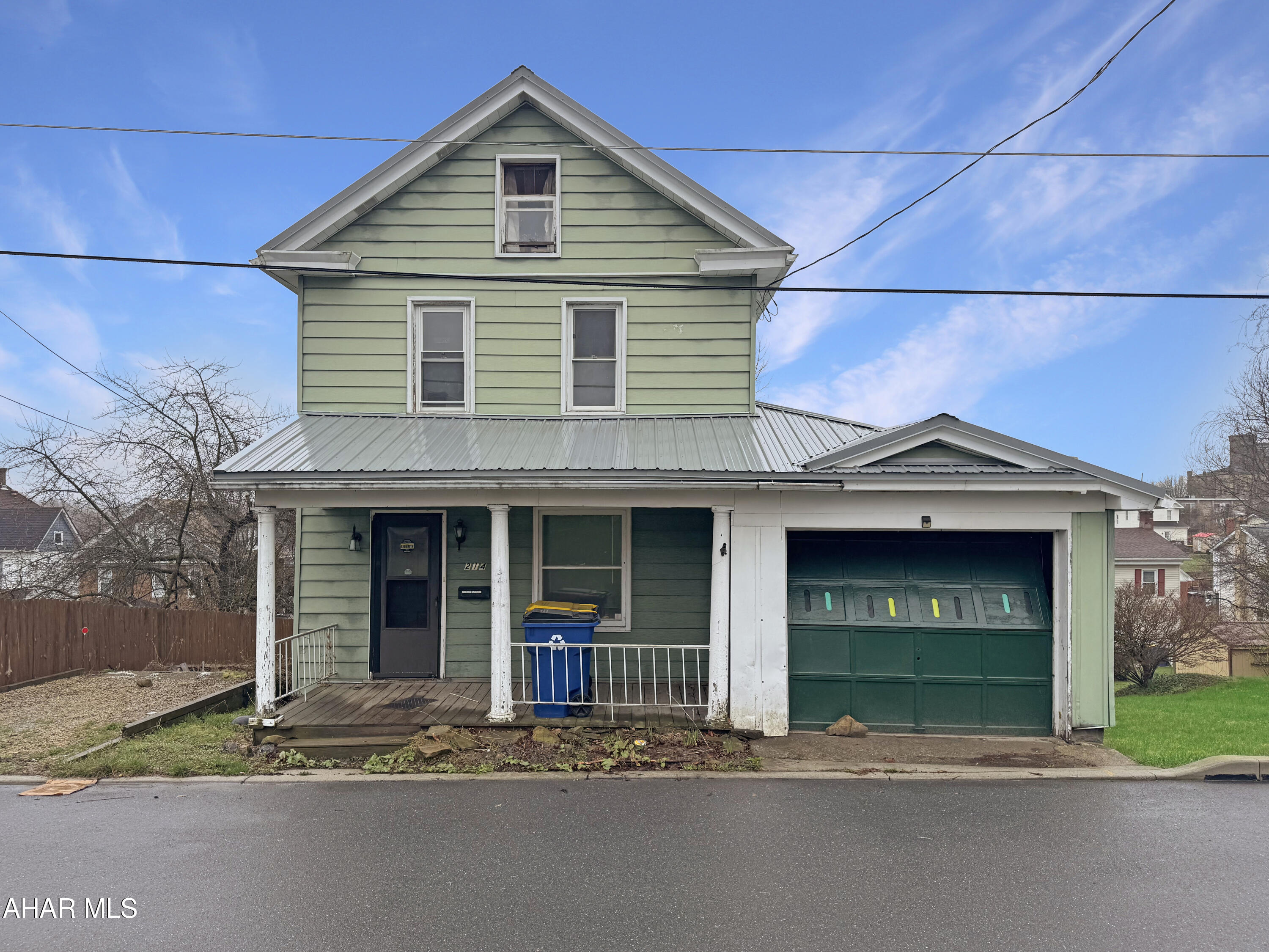 Welcome to 214 E Alton Street, located in the charming Ebensburg Borough. This delightful home presents a wonderful opportunity for those looking to add their personal touch. While it requires some minor TLC, it offers immense potential for the right buyer. Recent updates include a metal roof, upgraded electrical, & a newer hot water tank. As you step into the main floor, you will be welcomed by a generous living area, a comfortable dining room, & a kitchen complete w/ a pantry for all your storage needs. Upstairs, you'll find two well-sized bedrooms along w/ a full bathroom. The unfinished basement offers laundry & additional storage options, ensuring that you have room to grow. Outside, enjoy the convenience of off-street parking, a one-car garage, & a spacious yard perfect for outdoor activities. Don't forget the inviting front & rear covered porches, ideal for enjoying your morning coffee or evening sunsets. This home is brimming with possibilities! Call today to schedule a viewing!