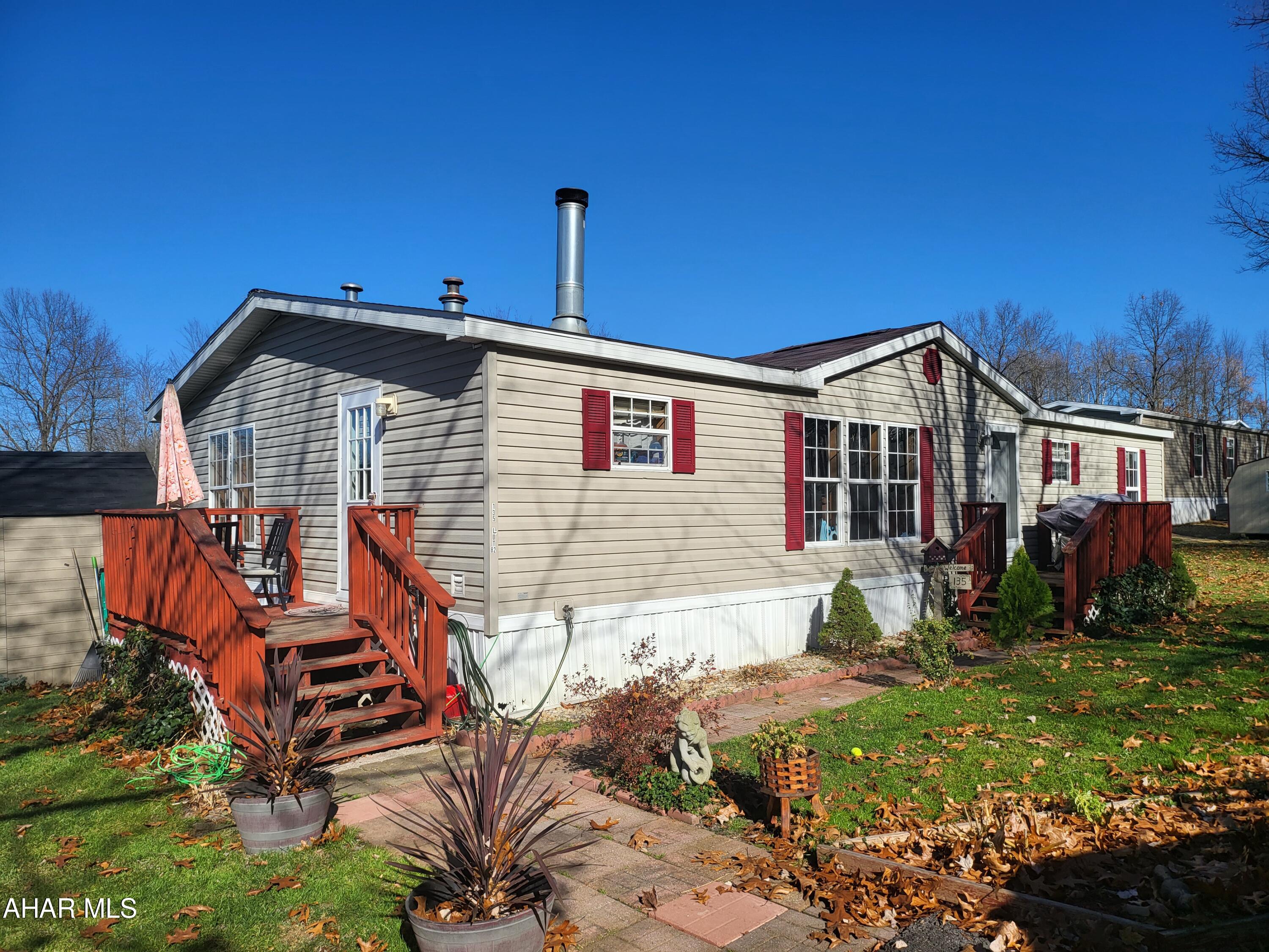 This spacious 2005 Colonial mobile home is  28x56.  High ceilings and an inviting fireplace welcome you.  3 Bedroom 2 Bath home with lots of parking. Windows recently installed in the living room.  Contact agent for further details.