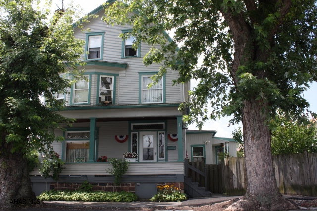 If you would like to live on a quiet corner in the city of Altoona, this is it. This charming house has been well maintained and updated. New roof was installed in 2002, new furnace 2008 with heat pump and central air.  Kitchen is large with eat in area and updated with Oak cabinets and Oak wood work. The wood trim in this house is outstanding.  Have your friends and family over and hang out on the lg covered front porch, deck and patio.  Read the morning paper and sip you coffee in the sun room located directly off the kitchen.  There is a small shed for tools and extra's and a 1 car garage.  This home is so cozy it will wrap it's arms around you when you walk through and view it. Set up a showing today!!!