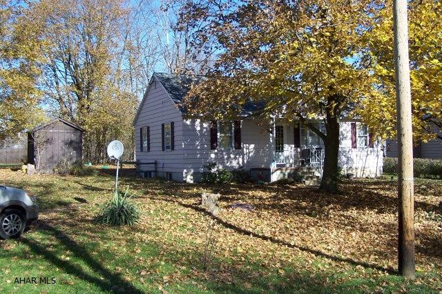 Charming one-story home with hardwood floors, arched doorways, updated kitchen & bath, covered front porch and back patio. Hollidaysburg schools. Foot-of-Ten elementary school.  This property qualifies for a rural housing loan (no money down). Why pay rent when you can own a home with no out-of-pocket expense! Want to open a business here? You can! Allegheny Township has no zoning.