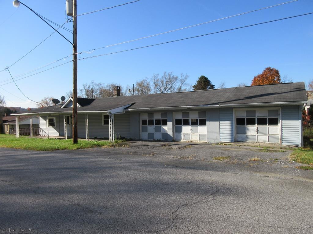 1 story Nanty Glo property on 0.59 acre lot with 3 car attached garage. Property needs work, but good layout and loads of possibilties. AS-IS sale. Seller will make no repairs. Buyer responsible for required municipal sewer test and any repair escrow.
