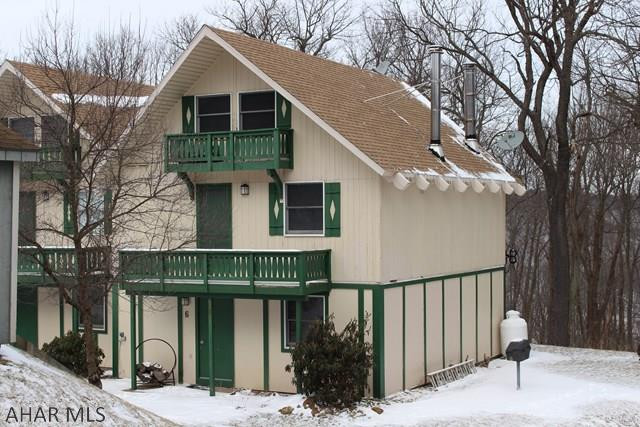 Fully renovated condo in Blue Knob!  This condo comes completely furnished with countless updates! Kitchen with hickory cabinets, granite countertops and stainless appliances (only 5 months old).  Open concept dining and living area. The living room has a wood burning stove, wall mounted flat screen TV, and wine hutch.  A sliding glass door from living area leads to a rear deck that looks out over the wooded mountainside.  Large master bedroom with plenty of closet space as well a wall mounted TV.  Updated full bath with ceramic tile! Currently rents for $1200/month!!!