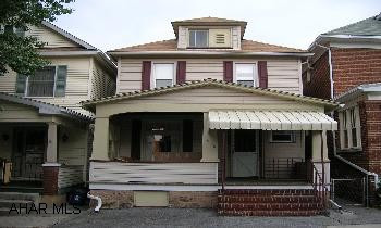 2-3 bedrooms, 2 baths w/ hardwood floors, new maple kitchen w/ceramic tile, finished basement, deck w/ hot tub, fenced yard, 1 car garage, new windows, vinyl siding, and newer roof. Average gas bill is $99.