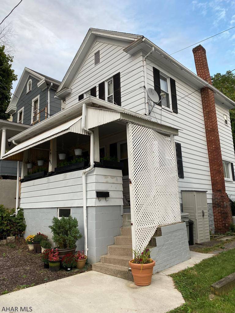 Home Sweet Home!  Why pay rent when you can own your own home!  Located in Bellwood Borough close to the school and in a quiet neighborhood, is this adorable 2 bedroom, 1 bath with a newer roof, thermo pane windows and C/A that's perfect for the first time home buyer.  You'll love the front porch!
