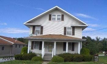 2 story 4 BR home on a 50 x 195 lot with 2 car detached garage. Being sold "as is - where is"