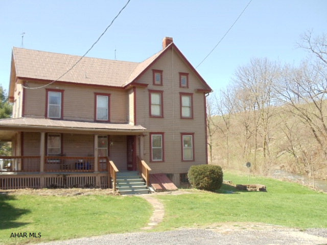 Stocked Trout Stream Beaver Creek borders property.  State Game Lands for Hunting approx 1 mile.  Nice 2-story home with wraparound porch, hardwood Floors, 1st-Floor Laundry, New Wood/Coal Furnace + 4 propane wall heaters & wood stove in dining room.  #J-064