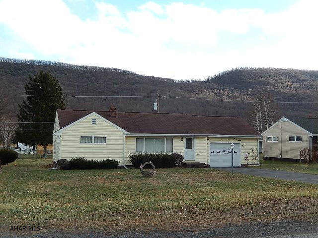 One story ranch home, shingled roof, vinyl sided, gas heat, public water & sewer, covered patio, spacious yard, finished basement, 1 1/2 car garage attached.