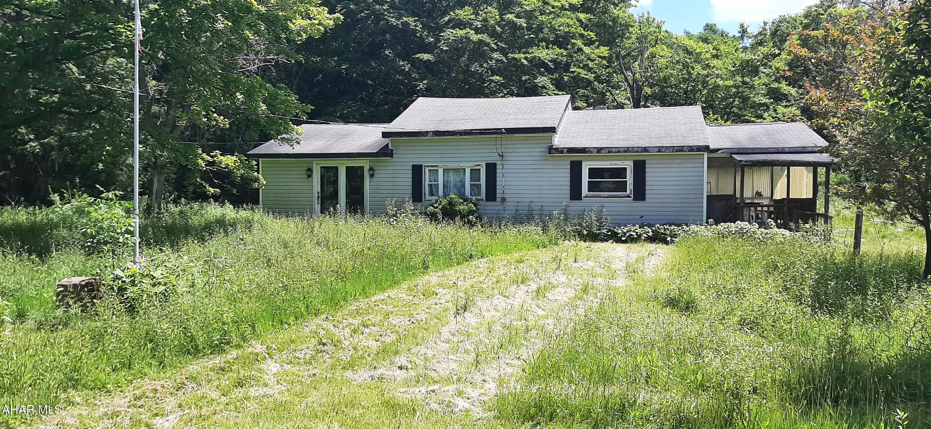 This property is in a great location! Nice flat one acre parcel being sold ''AS IS''. House is in very rough shape. May need torn down. Please use caution when showing.