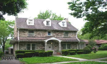CHARMING ALL STONE HOME IN MANSION PARK.  NICE PRIVATE BACKYARD.  HOME WARRANTY, NEW RUBBER ROOF ON SUNROOM (1998), FINISHED THIRD FLOOR, LARGE BACK PORCH.