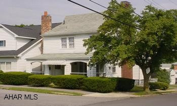 Tons of potential - great Fairview location!  This 3 BR home has hardwood floors, formal dining room and nice corner lot.  Hot water heat. Lots of potential in this nicely-located 3 bedroom home in Fairview.  Great front porch, corner lot and hot water heat.   To settle estate.