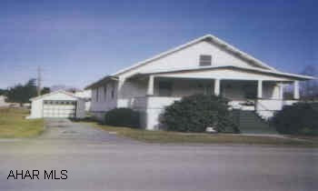 1.5 STORY BUNGALOW WITH 1 CAR DETACHED GARAGE. 4 BEDROOMS, LARGE LEVEL LOT, NEWER ROOF AND WINDOWS, LARGE ATTIC STORAGE AREA.  SELLER IS EXECUTRIX FOR EST. OF JAMES VEIGN AND IS A LICENSED REALTOR.
