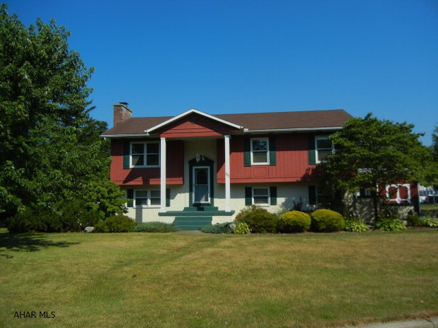 Immaculate 3 bed., 2.5 bi-level on a corner lot across from Legion Park. Storage heat units  in living and dining rm. Average electric $214.00. Large deck off dining rm.