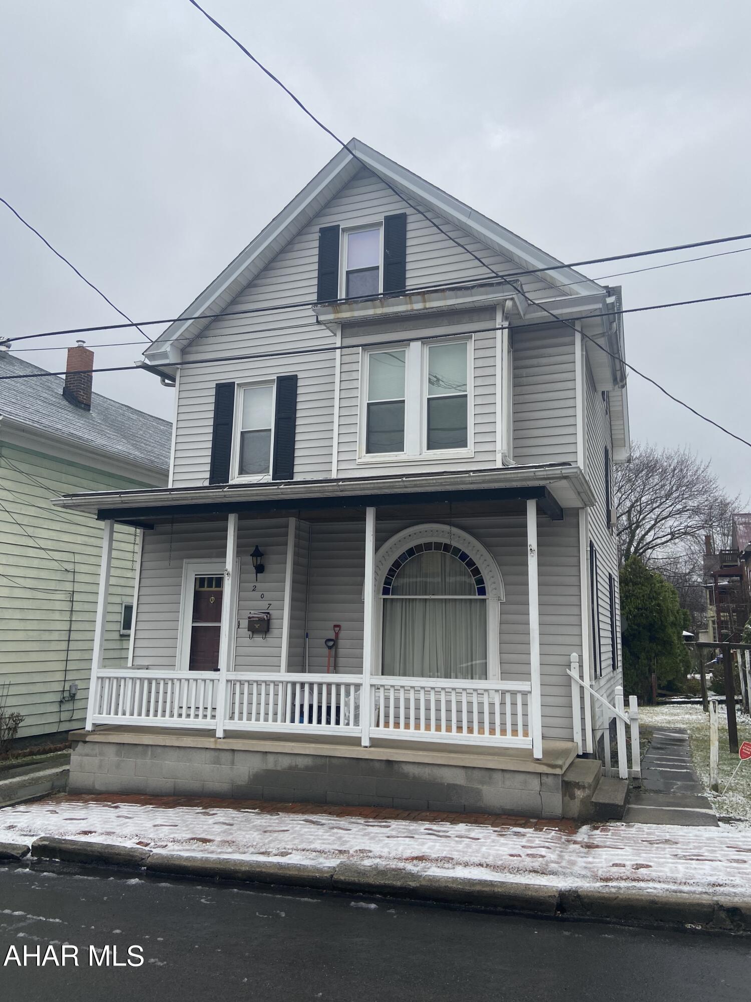 Very nice 3 bedroom with 2 extra rooms. Enjoy the front porch on summer evenings. When you enter the house you will be welcomed by beautiful hardwood floors. Newer carpet!! Cute home that is well kept.