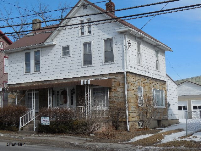 OWNERS WANT OFFERS! Move in ready! New 100 amp electric and attic insulation. Gas fireplace. Root cellar for your canned goods.  Flat yard with covered patio out back. Great home! 2 car garage
