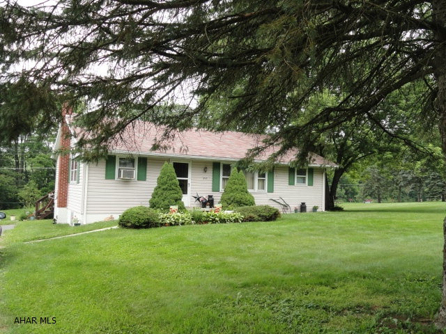 Lovely rural rancher situated on over an acre. 3 bedroom, 1.75 baths. Eat-in kitchen, large rooms. Partially finished full basement with walk-out. Large flat yard, shed, trout stream. Great country setting, wonderful family oriented neighborhood.