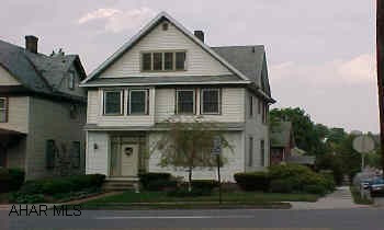 Attractive family home on landscaped corner lot, rear deck,family room, good in-town location. Finished 3rd floor.