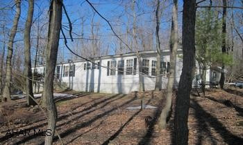 A Little Bit Of Heaven - Very Secluded - 1991 Commodore, 28x66 - With Full Foundation - 5 Skylights (Anderson) - Full / Partial Basement W / Concrete Floor On 5 Acres - U.V. Light In Well - Dish TV - Deed Restrictions. A Little Bit Of Heaven - Very Secluded - 1991 Commodore, 28x66 - With Full Foundation - 5 Skylights (Anderson) - Full / Partial Basement W / Concrete Floor On 5 Acres - U.V. Light In Well - Dish TV - Deed Restrictions.  Owner Looking For Offers.
