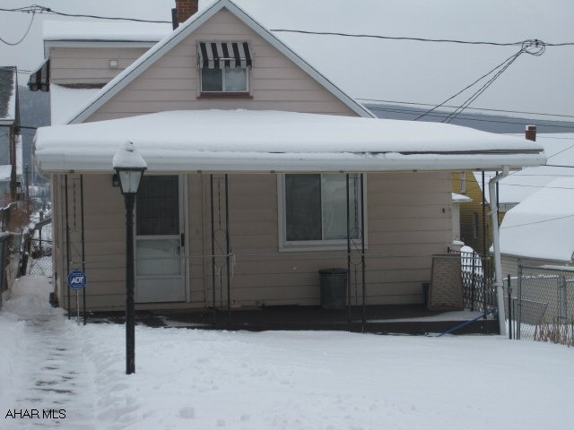 1 1/2 story home with off street parking.  Enjoy first floor living with 1st floor bedroom, bathroom, and laundryroom.  Finished 2nd floor bedroom.  Finished basement.  Newer roof, furnace and water heater.  Newer windows on 1st floor.