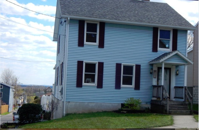 Move-in ready. New roof, furnace, windows and updated electric. Remodeled full bath and fully finished family room in the basement. 3 spacious bedrooms, master has his and her closets. Appliances included. Hardwood floors. Large 2-car attached 18 garage and concrete deck for entertaining. Fenced yard provides privacy and safety.