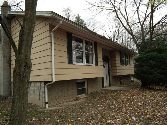 Priced to sell-Property lot is .85 acre, split level home has 3 bedrooms 1 Bath-partially finished basement-basement wall will need work