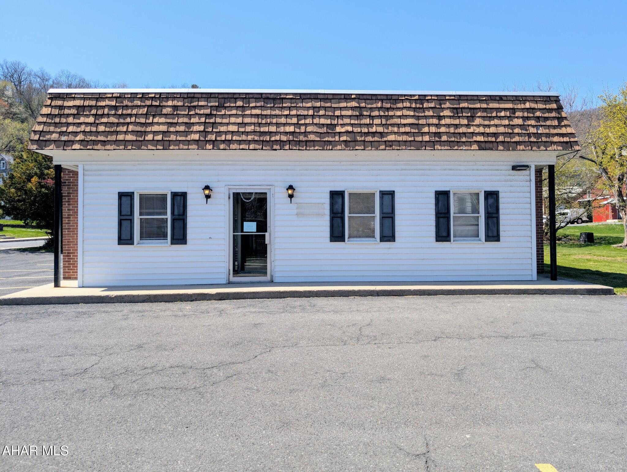 Income building opportunity with this great office building.  Walking distance from downtown Everett, this well maintained property has large private parking on a flat lot.  ADA compliant exterior and interior.  Previously a medical facility, it comes with 7 rooms previously used as exam rooms, 3 offices, 2 restrooms, a large waiting area.  This can be reconfigured with ease and includes 2200+ square feet.  This would make a great professional building, retail space, office space, beauty/barber shop, day care or so much more .  Commercial buildings like this are hard to find.  Schedule a showing today.