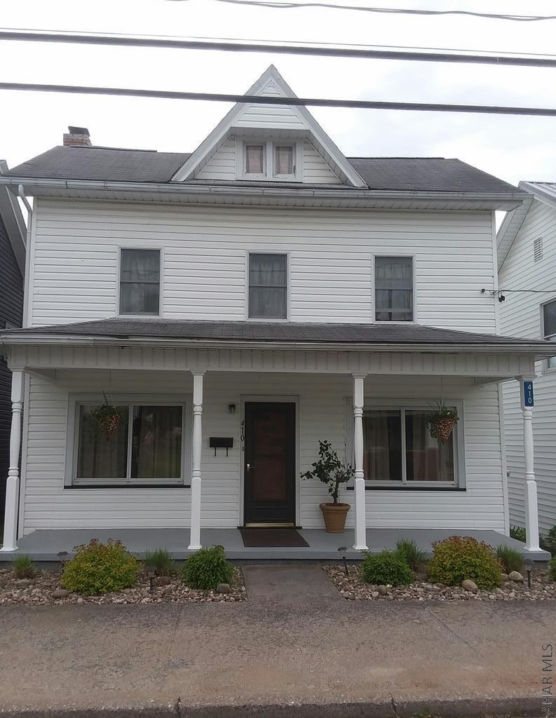 Spring Cove School District...2 Story vinyl sided home. The first floor has living room, bonus room, dining room, bonus room with laminate flooring, full bath, kitchen with all appliances. 2nd Floor there is 3 bedrooms with carpet and full bath, attic for storage, basement, laundry, utility room and workshop. Relax on the front porch or back deck and grill on the patio. This home also has a 1 car garage, black top driveway and a well manicures lawn. Listed for $132,000..Don't delay call for a showing today!