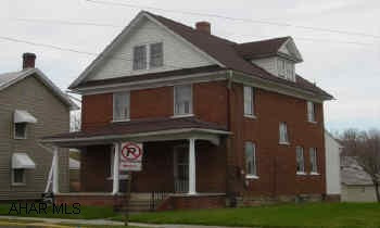 Large brick home, good condition, 3rd floor has 2BR's, 2 car garage and off street parking. Bath also in basement. Large brick home, good condition. Third Floor has 2 BR's. 2 car garage and off street parking. 1/2 bath in basement..