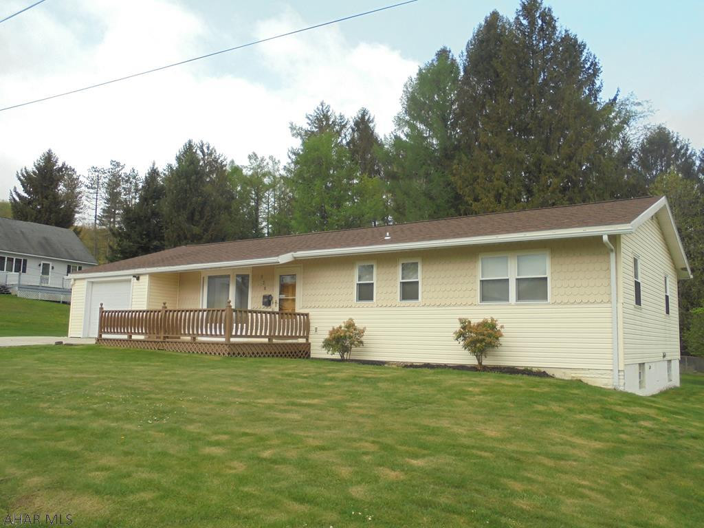 Ebensburg- 3BR, 2 bath vinyl sided ranch on level 100 x 150 lot. Newer roof, remodeled kit, gas fireplace in LR, gas HW heat & enclosed sun porch. 1 car attached garage. This one won't last $169,900