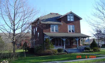 HISTORIC HOLLIDAYSBURG HOME with warmth and charm throughout. Large level lot, spectacular  kitchen with granite countertop, fabulous original wood trim throughout. Fireplace with beautiful oak  mantle, newer roof, central air. NOT in Historic District. HISTORIC HOLLIDAYSBURG HOME with warmth and charm throughout. Large level lot, spectacular kitchen with granite countertop, fabulous original wood trim throughout. Fireplace with beautiful oak mantle, newer roof, central air. Large finished attic with 2 bedrooms, full bath and office. NOT in Historic District. Owner will consider $5,000 exterior painting allowance.