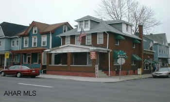 Good brick property with two apartments and barbershop BRING OFFERS!!  Drastically Reduced!! Seller will sacrifice for $21,000 if closed by 12/30/02. Good brick property with two apartments and barbershop. Grosses almost Eleven Thousand per year.