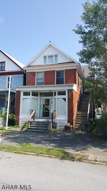 Investors!  Very unique, store front property in the heart of Juniata.  The main show room is 18 x 25, with a large warehouse/workshop in the rear.  The second floor is currently a vacant, 2-3 bedroom apartment with stove and refrigerator included.  The first floor could easily be converted into a salon, convenience store, office space or made into an open floor plan apartment, providing not one but two rentals. Three off-street parking spaces are available at the rear of the building. The property is within walking distance of the Norfolk Southern shop's in Juniata, and close to the Penn State Altoona Campus.  With so many possibilities, this property is only limited by your imagination!  Call the listing agent today for your private showing.