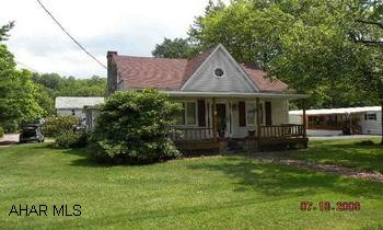 1 1/2 story 3 BR, vinyl sided home with master bedroom & bath on first floor. New deck & front porch.