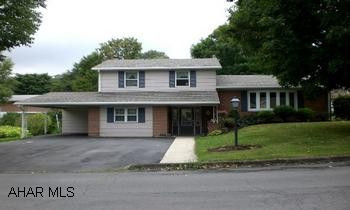 Split level home w/ fam. room; LR; kitchen, DR; 4 BR; 1 and 1/2 BA. New shingle roof, brick cased and masonite siding, oil/hot water heat; carport & macadam driveway. Mature plantings. Spacious split level home in a sought after residential area. Offering a family room w/ sliding doors to a rear patio, living room w/ bay window, kitchen w/ oak cabinetry, dining area, four bedrooms and one and a half baths. New shingle roof, brick cased and masonite siding, oil hot water heat, carport and macadam driveway. Landscaped lot w/ mature plantings.