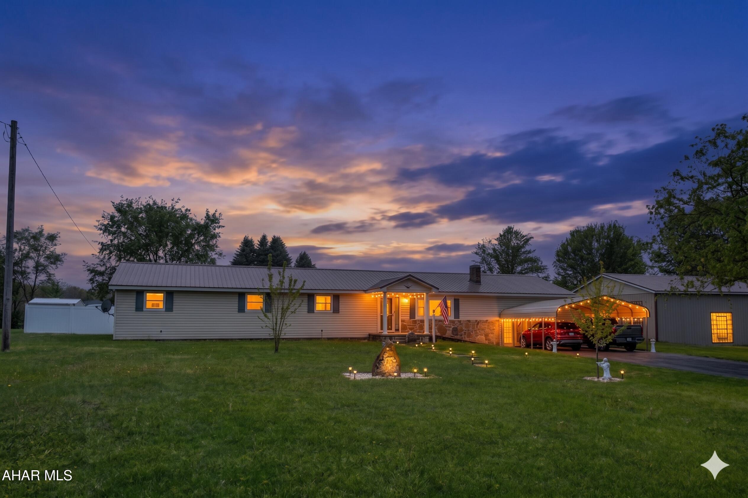 If you are looking for a ranch style home close to town amenities, but far enough away to be your own private sanctuary - this is it! 4 Bedrooms, 2 Baths, a large family room, pantry and plenty of storage space - all on one level! There's an open concept kitchen and dining area... a living room with a gas fireplace and a primary suite with a full bath.  There's also a large bonus room with high ceilings perfect for a theater room, a man cave or get creative and turn it into a guest suite! Outside, you have a beautiful gazebo to sit in and relax on those warm summer nights. The fire pit is right next to it and there are several storage sheds on the property as well - plus an additional 2 car garage!  All of this on just under an acre of land!