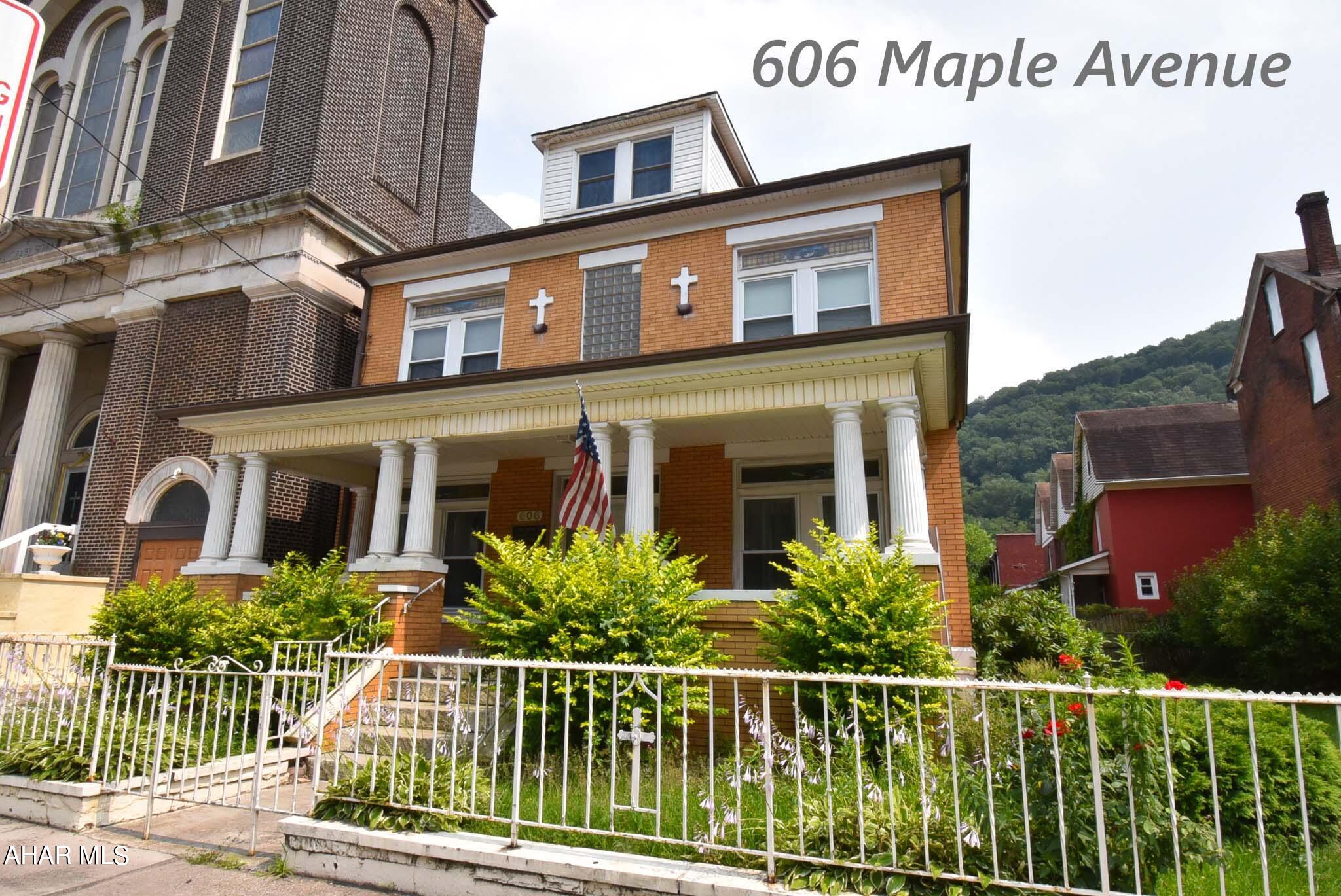 This former church rectory can be easily restored into a single-family home with 5 bedrooms. There's a fenced in yard and a 1-car detached garage. This property can give you plenty of options. Sewer work completed.