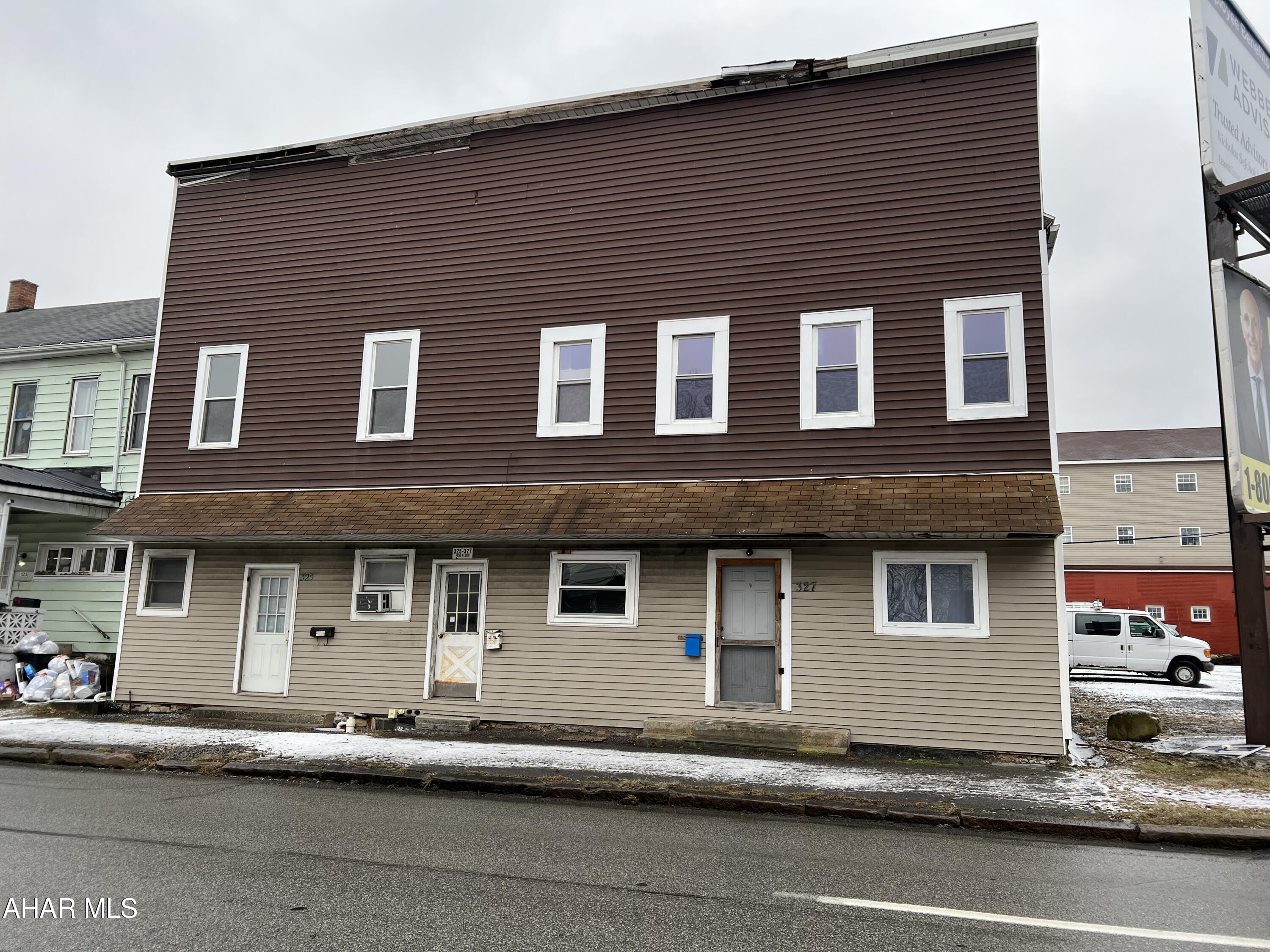 Four-unit rental property. The two units on the lower level have been updated and are currently rented.  Each are two bedrooms with one bathroom

The send level units were undergoing renovations and just need a bit more finishing touches before they can welcome new tenants.  One is four bedrooms 1 bath and the other is two beds one bath