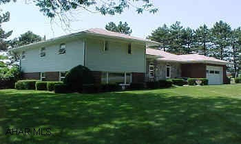 1966 split level. Stone & vinyl sided.  Very good condition. Good curb appeal. Central air. Hardwood floors. Family room.