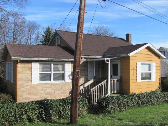 Escape to this 3 BR Cape Cod home where privacy abounds! The interior of this charming home features LR, DR, kit, 3 BR's & much more.