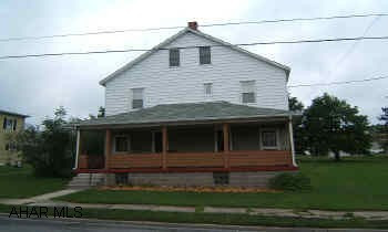 Lg. 2 story home with 5 bedrooms on large level double lot.  Newer windows & furnace.  Double staircase.  Ample storage in attic. 5 b/r home on double lot in Sankertown.  Cvd front porch, enclosed back porch.