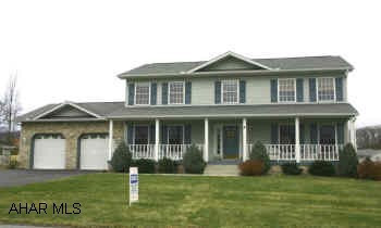 BEAUTIFULLY DECORATED 4 BEDROOM, 2.5 BATH HOME.  STONE PATIO AND POND.  LARGE COVERED DECK.  MINUTES FROM ELEMENTARY SCHOOL.  PERGO FLOOR IN KITCHEN, SKYLIGHTS IN BATHROOM, LARGE WALK-IN CLOSET IN MASTER BEDROOM, 2ND FLR LAUNDRY.