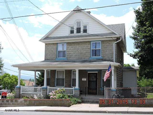 Classy home with original wood work and floors, pocket doors, and original fireplace.  Home has all the modern conveniences of central air & modernized baths.  Newer modern kitchen, replacement windows & gas insert in fireplace.  17x14 (3) season room off kitchen with bamboo floor is large & bright with vaulted ceiling.  Large yard has fenced area for children or pets.