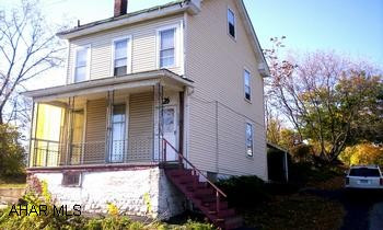 2.5 story, vinyl sided home. 90% efficient gas furnace.  100AMP electric. Romex wiring.  Panelled interior with dropped cielings.  Wall to wall carpet.  Nice interior and updated bath.